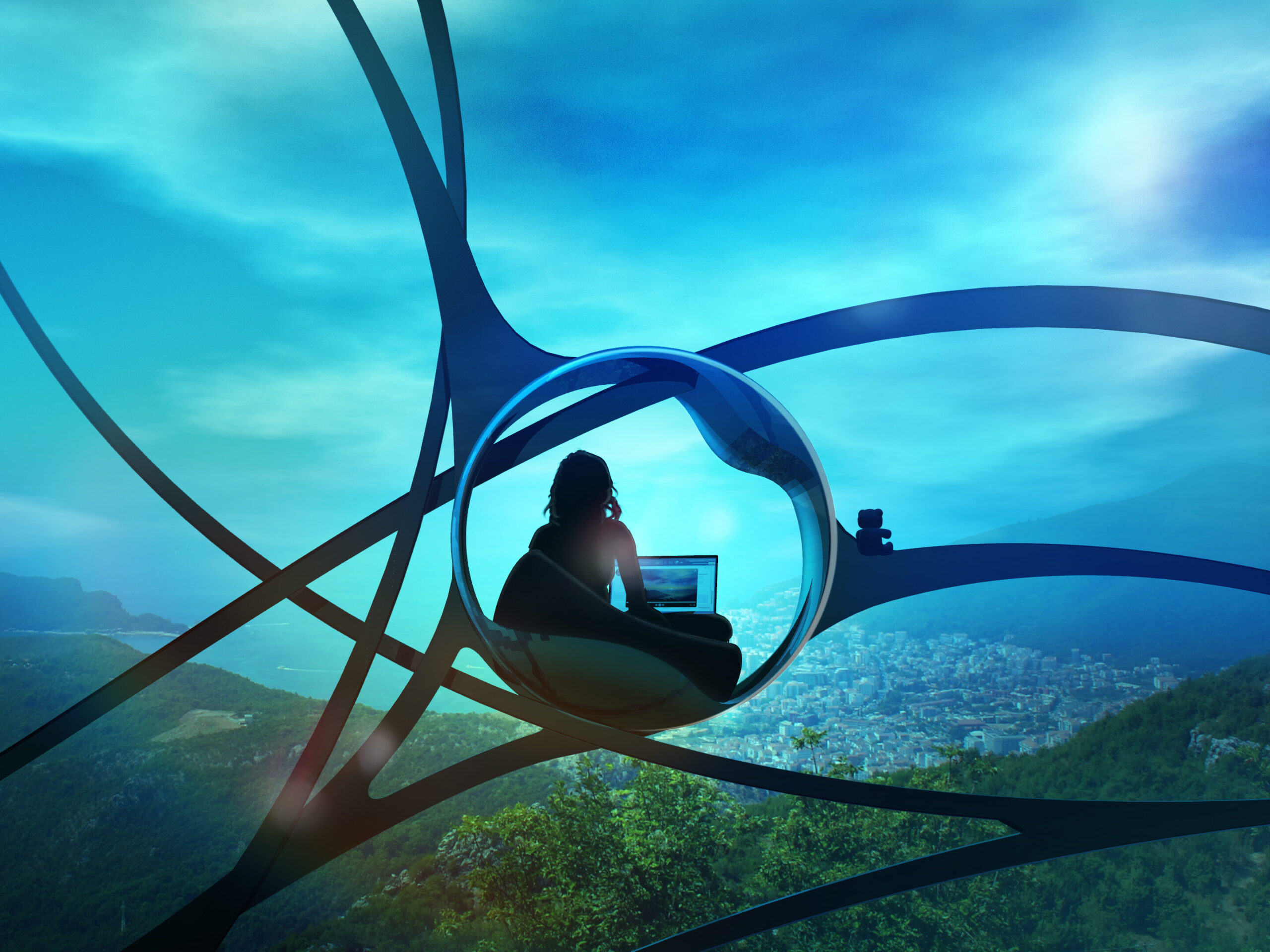 Eine Frau sitzt an ihrem PC in einer Kugel. Dabei hat sie einen Ausblick auf die Natur